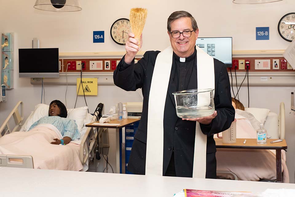 Vice President of Mission and Identity David Suwalsky, S.J., Ph.D., took part in a dedication ceremony of the Trudy Busch Valentine School of Nursing Hemak Simulation Lab. Photo by Luke Yamnitz.