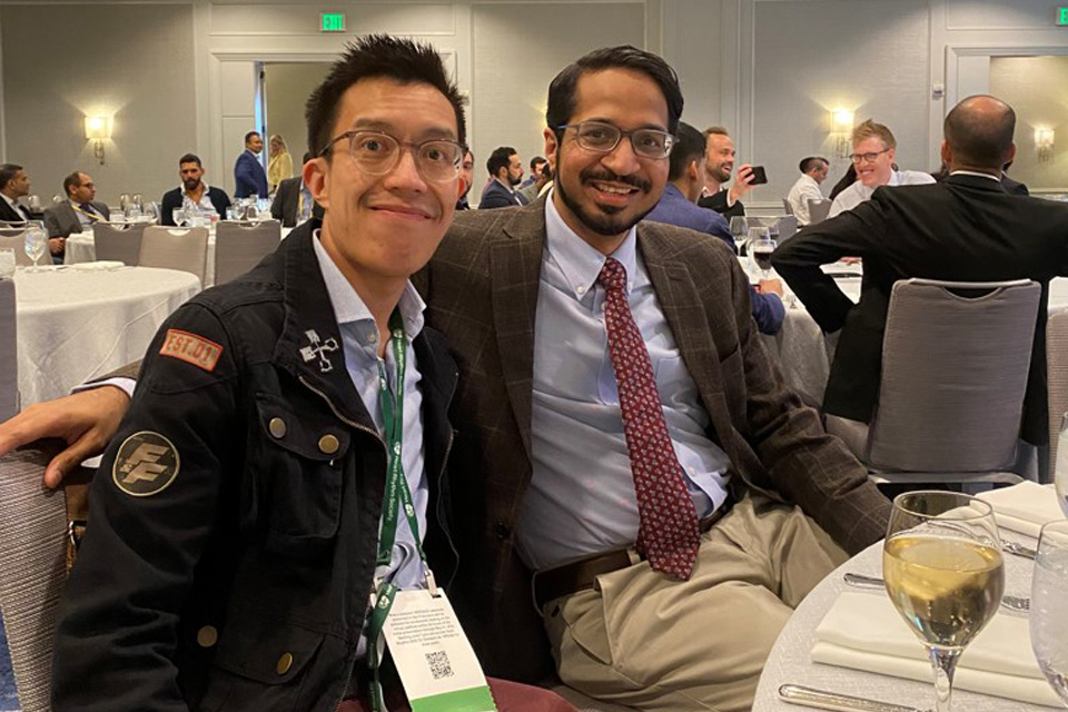 Fellow Hiren Patel, M.D. sitting with another fellow