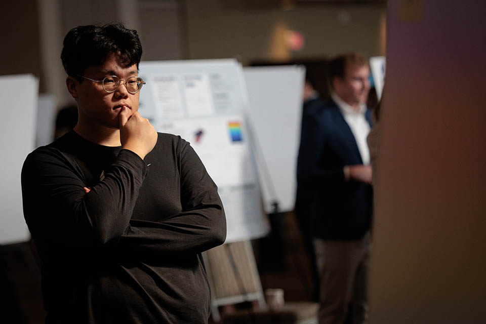 Seniors exhibit their research projects during the Senior Legacy Symposium on May 2, 2023. Photo by Sarah Conroy. 