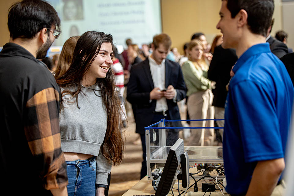 Seniors exhibit their research projects during the Senior Legacy Symposium on May 2, 2023. Photo by Sarah Conroy. 