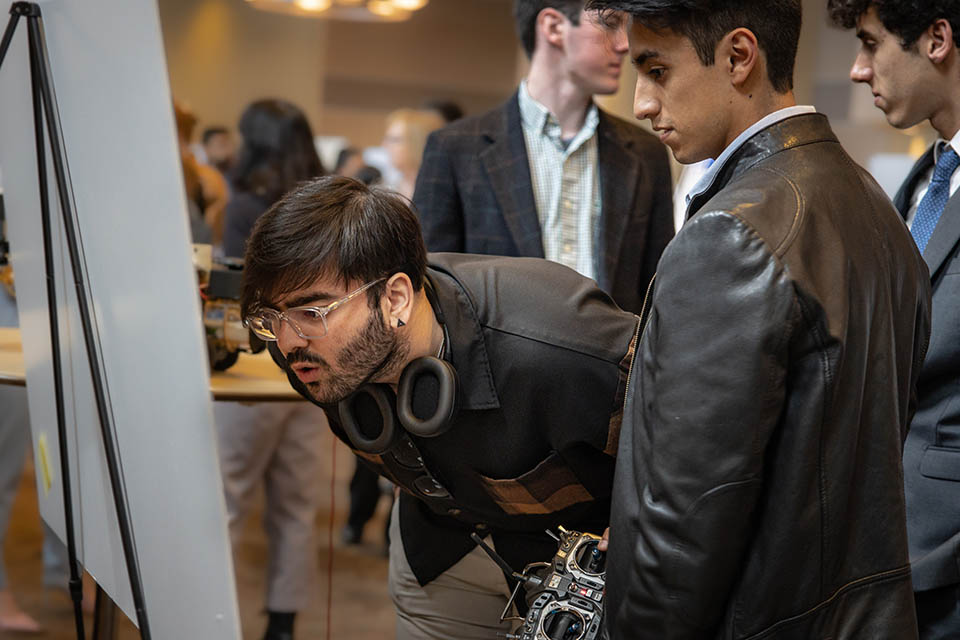 Seniors exhibit their research projects during the Senior Legacy Symposium on May 2, 2023. Photo by Sarah Conroy. 