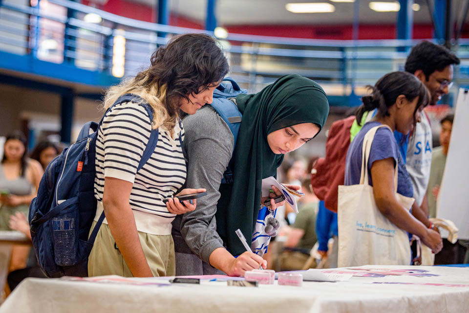 Students explore clubs and service organizations during the Student Involvement Fair on Saturday, Sept. 9. Photo by Sarah Conroy.