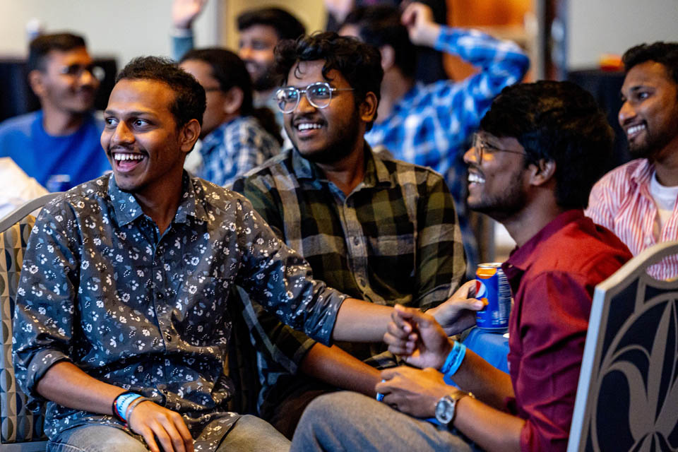 Students watch the fashion show as part of the International Services President’s Reception on Monday, Sept. 18. Photo by Sarah Conroy. 

