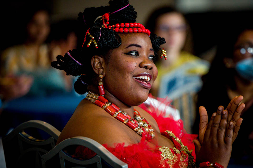 A student dressed in traditional Igbo attire listens as President Fred P. Pestello, Ph.D., speaks during the International Services President’s Reception on Monday, Sept. 18. Photo by Sarah Conroy. 