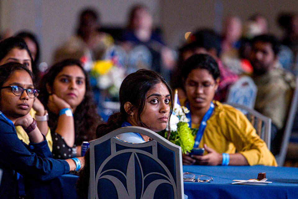 Students listen as President Fred P. Pestello, Ph.D., speaks during the International Services President’s Reception on Monday. Sept. 18. Photo by Sarah Conroy. 