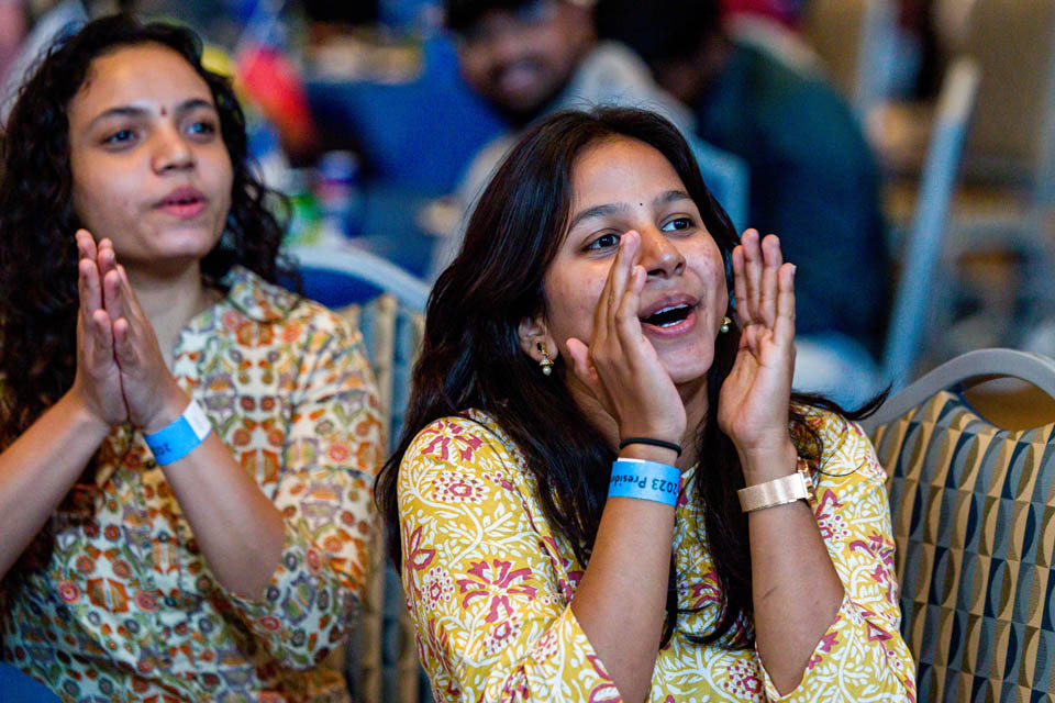 Students cheer during the fashion show as part of the International Services President’s Reception on Monday, Sept. 18. Photo by Sarah Conroy. 