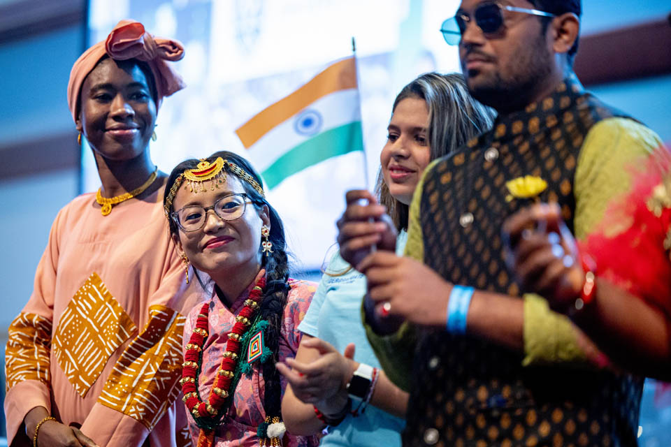 Students participate in a fashion show during the International Services President’s Reception on Monday, Sept. 18. Photo by Sarah Conroy. 