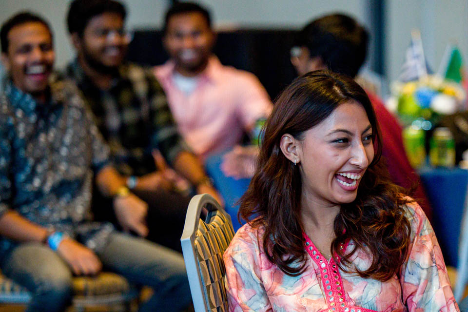 Students watch the fashion show as part of the International Services President’s Reception on Monday, Sept. 18. Photo by Sarah Conroy. 