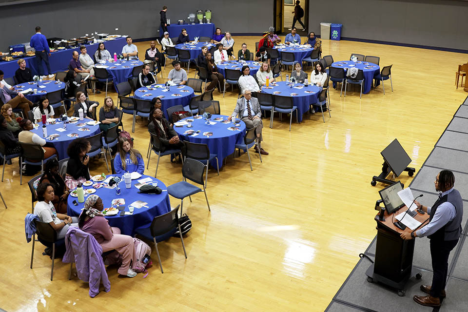 Aric Hamilton, Program Coordinator for Academic Affairs at the SLU School of Law, read a speech from Martin Luther King Jr. on Thursday, Oct. 12. Photo by Joe Barker.