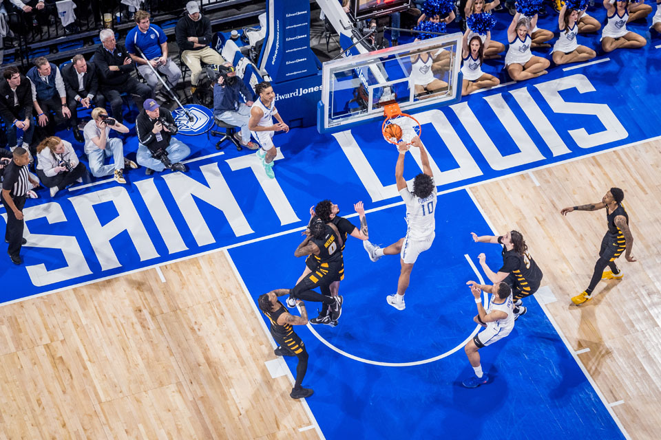 Jake Forrester scores during the “Billiken Blizzard” game against VCU on Feb. 3, 2023. Photo by Sarah Conroy.