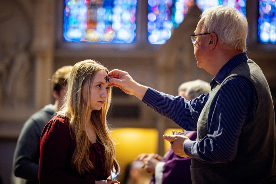 Members of the SLU community receive ashes during Ash Wednesday Mass at St. Francis Xavier College Church on  Wednesday, Feb. 14. Photo by Sarah Conroy.