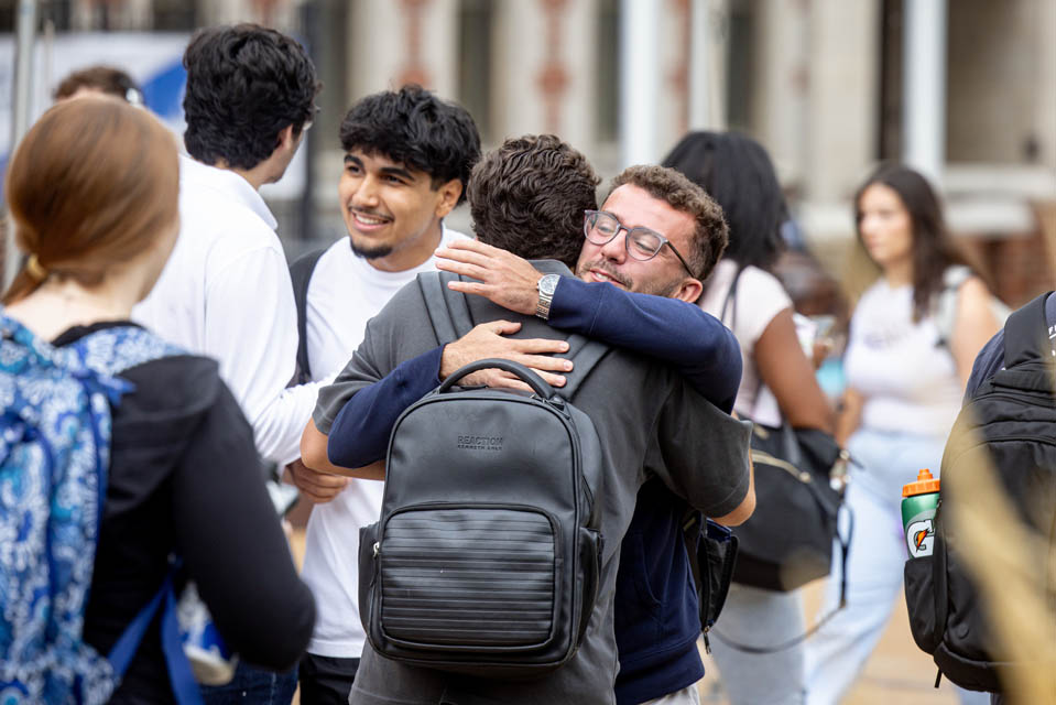 Friends greet each other on the first day of the fall semester on Tuesday, Aug. 21, 2024. Photo by Sarah Conroy. 