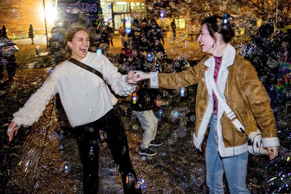 Christmas on the Quad attendees enjoy the festivities. Photo by Sarah Conroy.