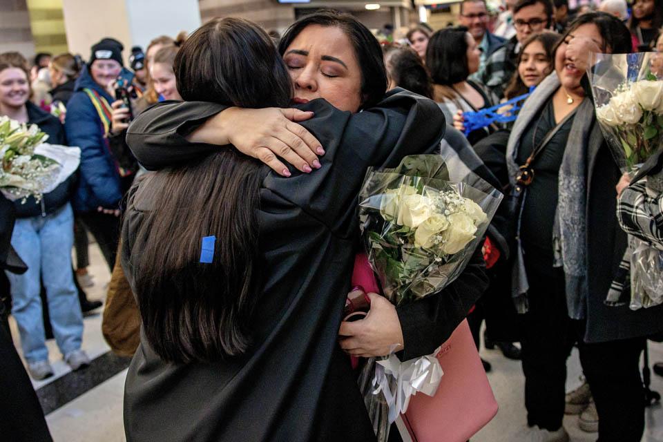 Graduates celebrate with family after Midyear Commencement on Saturday, Dec. 14, 2024. Photo by Sarah Conroy. 