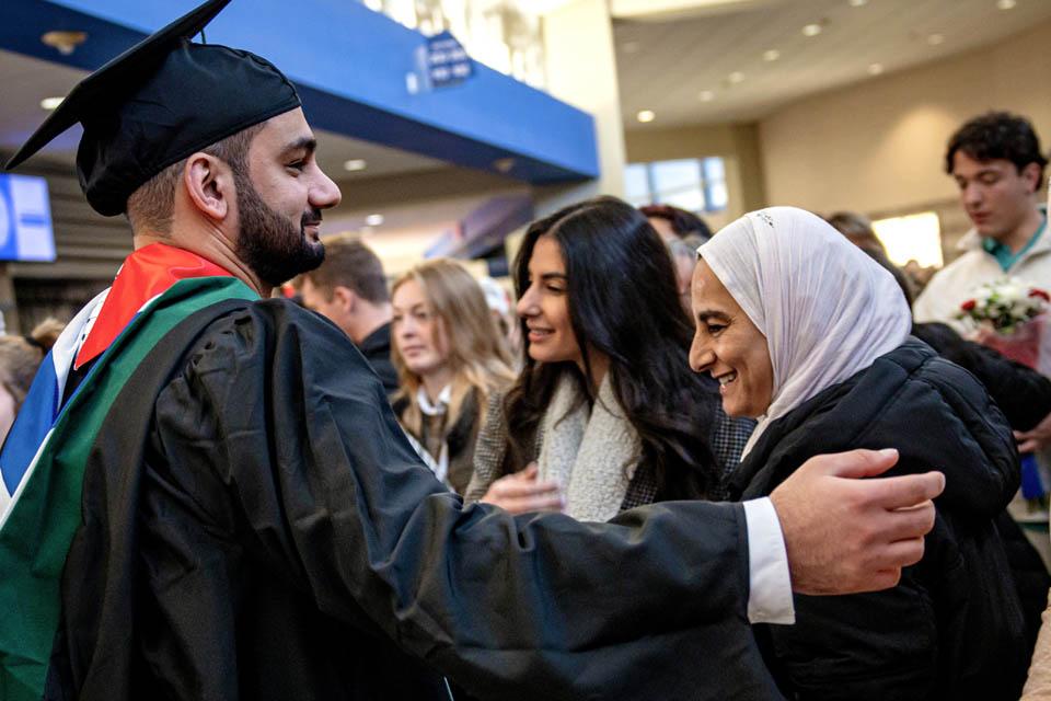 Graduates celebrate with family after Midyear Commencement on Saturday, Dec. 14, 2024. Photo by Sarah Conroy. 