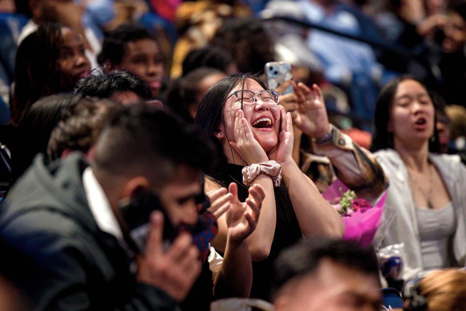 A family member cheers for a graduate during the Midyear Commencement on Saturday, Dec. 14, 2024. Photo by Sarah Conroy. 