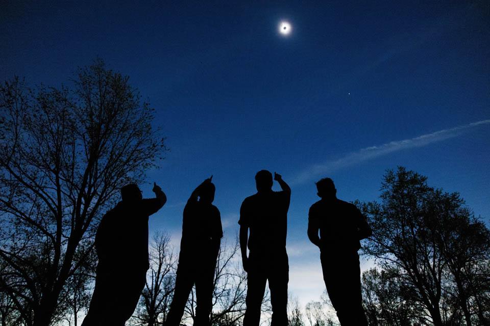 Meteorology students take in the totality of the solar eclipse at Trail of Tears State Park on April 8, 2024. This picture earned Conroy third place in the University Photographer's Association monthly photography contest. Photo by Sarah Conroy. 