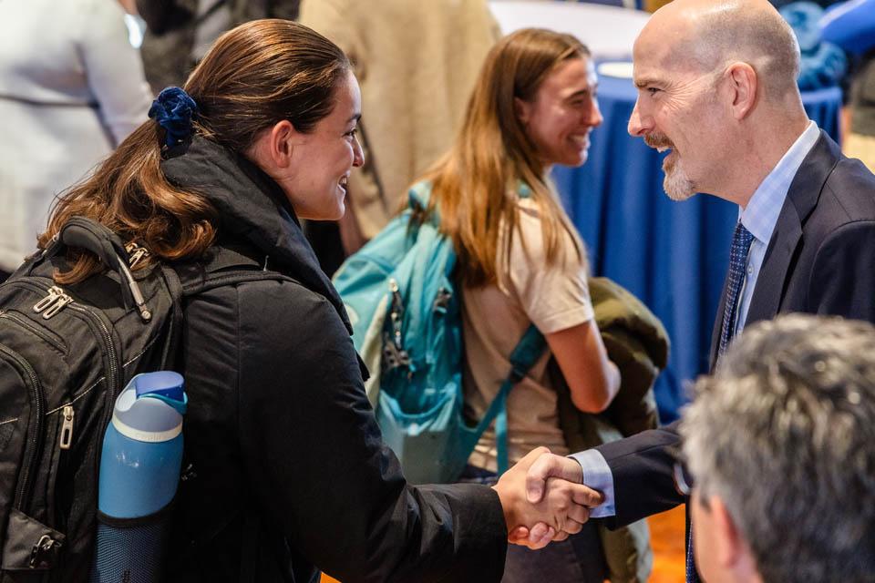 President-elect Edward Feser, Ph.D., meets with the SLU community in the St. Louis room on Tuesday, Jan. 14, 2025. Photo by Sarah Conroy. 