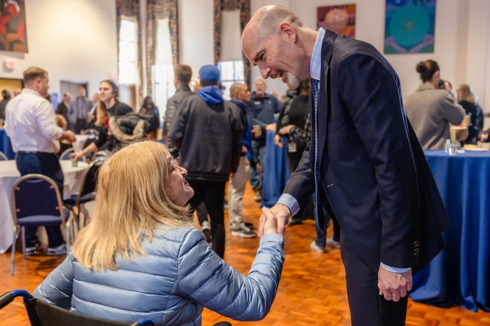 President-elect Edward Feser, Ph.D., meets with the SLU community in the St. Louis room on Tuesday, Jan. 14, 2025. Photo by Sarah Conroy. 