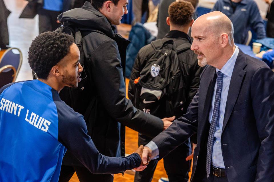 President-elect Edward Feser, Ph.D., meets with the SLU community in the St. Louis room on Tuesday, Jan. 14, 2025. Photo by Sarah Conroy. 