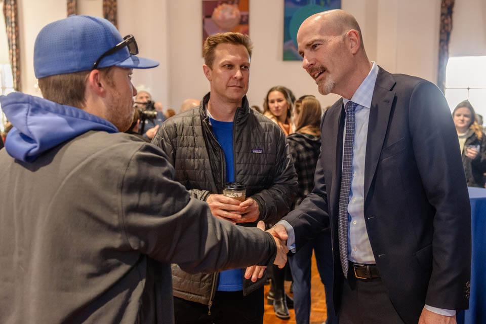 President-elect Edward Feser, Ph.D., meets with the SLU community in the St. Louis room on Tuesday, Jan. 14, 2025. Photo by Sarah Conroy. 