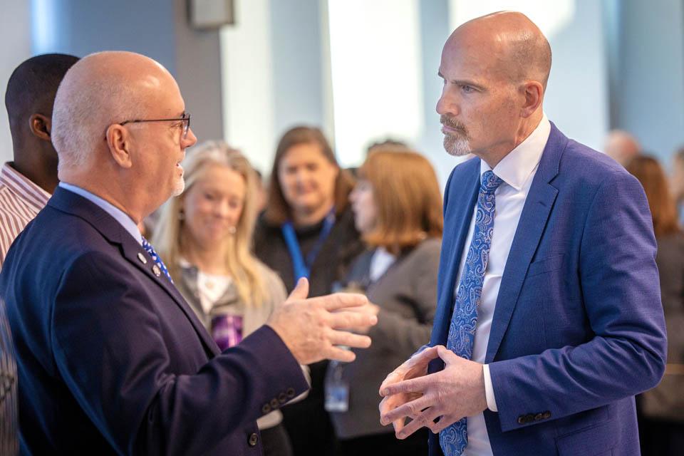 President-elect Edward Feser, Ph.D., meets students during a reception at the Allied Health Building on Monday, Jan. 13, 2025. Photo by Sarah Conroy. 