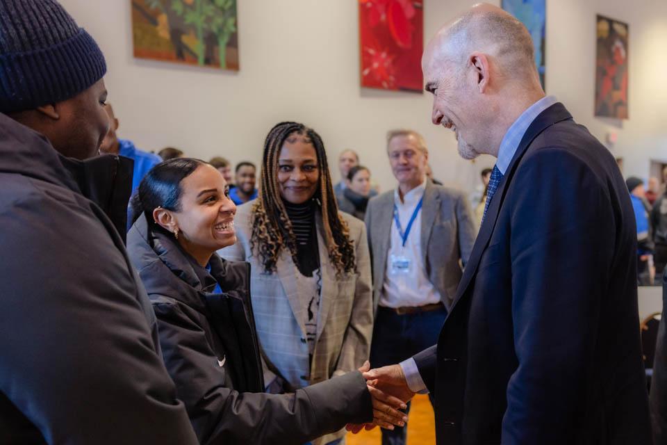 President-elect Edward Feser, Ph.D., meets with the SLU community in the St. Louis room on Tuesday, Jan. 14, 2025. Photo by Sarah Conroy. 