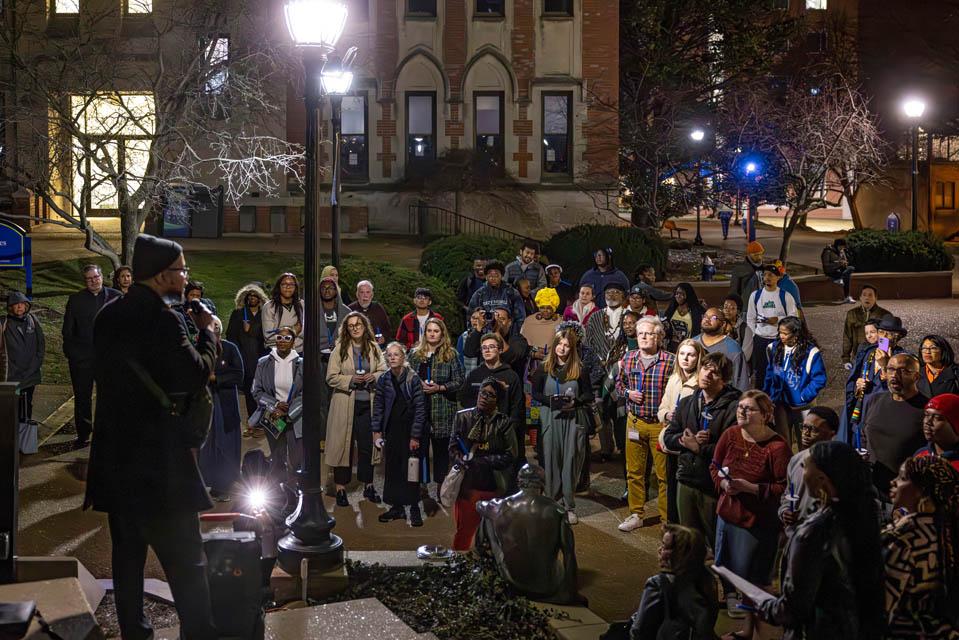 Jonathan Pulphus, Jr. gives a tribute to Jonathan Smith at the clock tower during the Lights of Remembrance Candlelight Vigil on Feb. 27, 2025. Photo by Sarah Conroy.