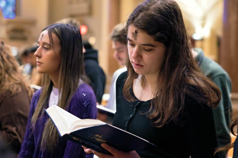 Students participate in Ash Wednesday Mass at St. Francis Xavier College Church on March 5, 2025. Photo by Sarah Conroy. 