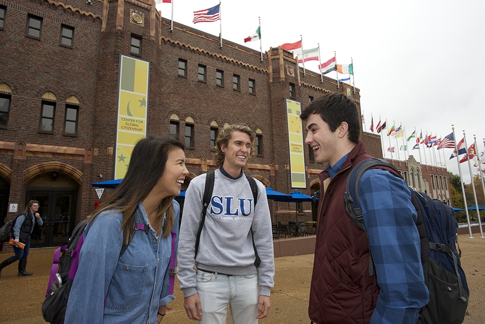 Students stand outside the Center for Global Citizenship