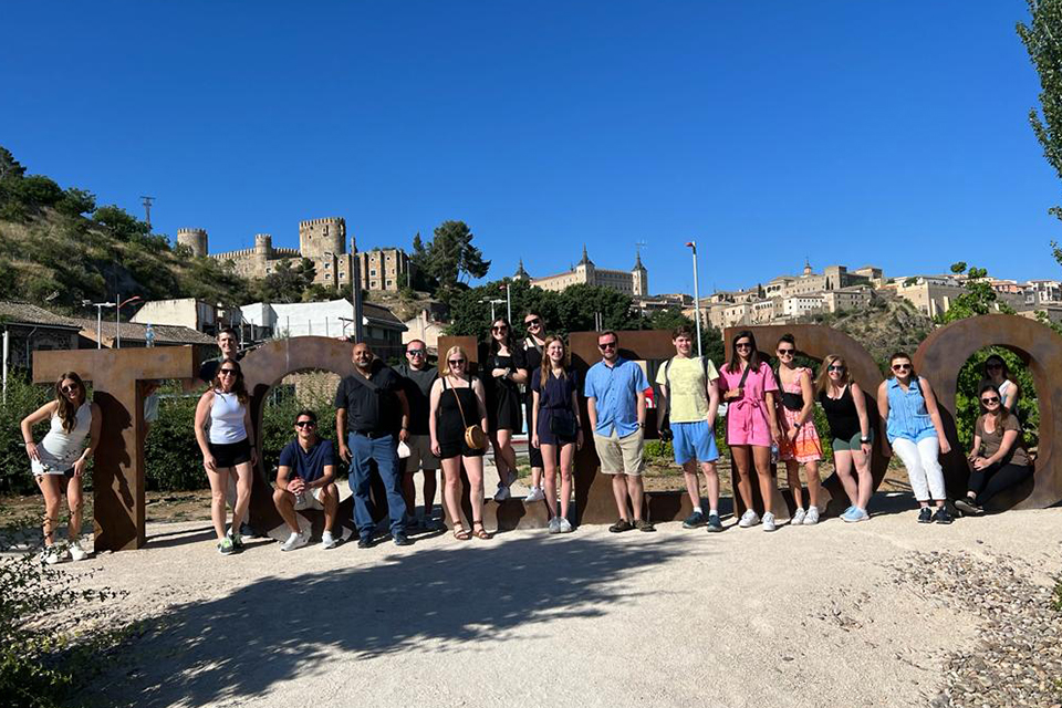 Students in Dr. Mamoun Benmamoun's European Business Strategies course pose for a class photo outisde of Toledo, Spain