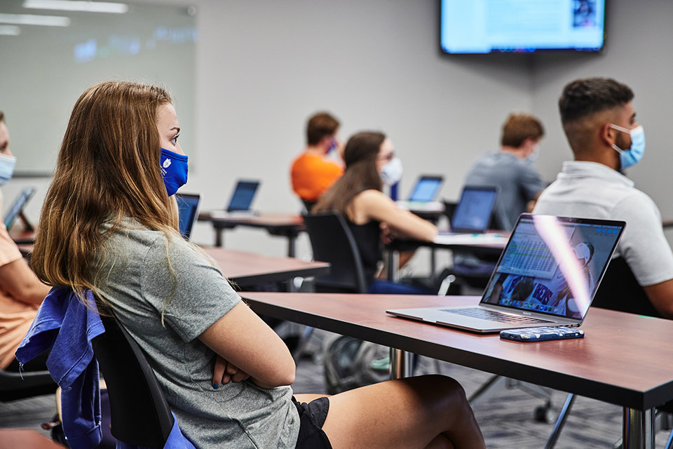 Entrepreneurship student with computer