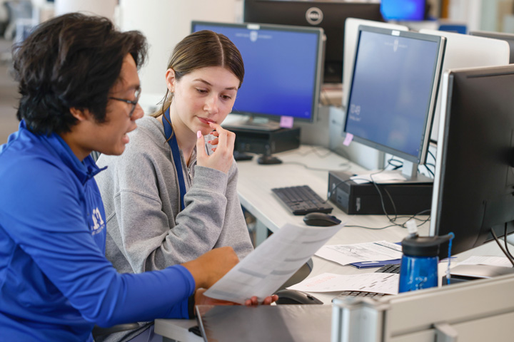 SLU student with advisor 