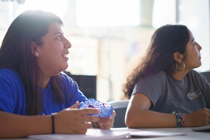 Two college students in a class at SLU