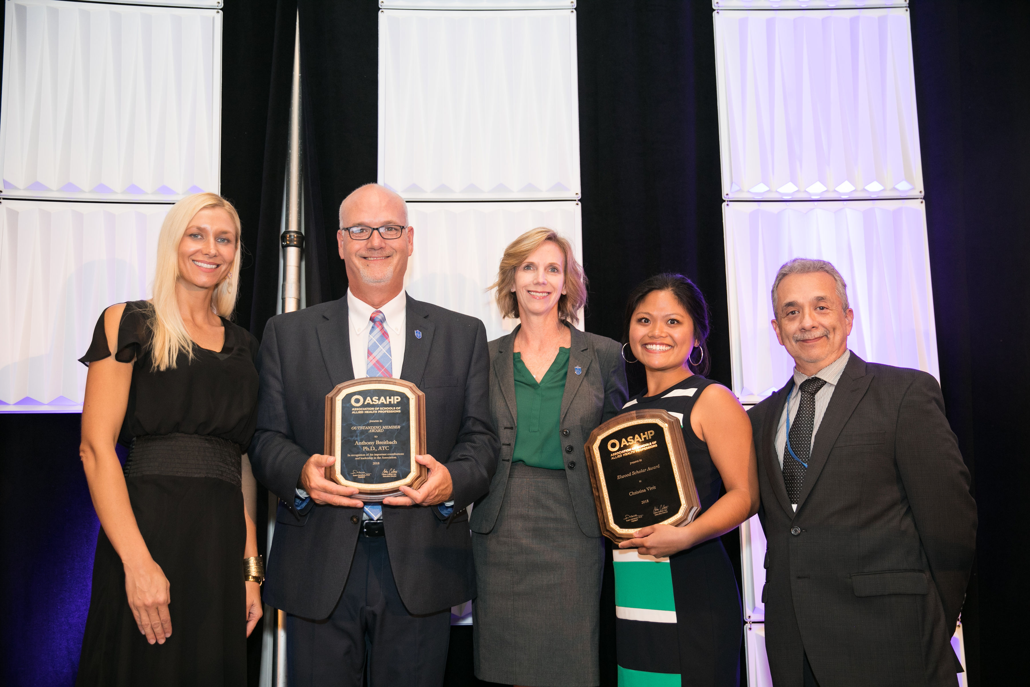 Dr. Breitbach Receiving Award