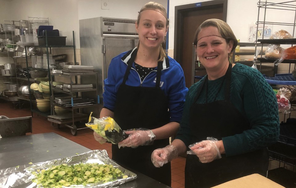 CHS members prepping meals at Campus Kitchen