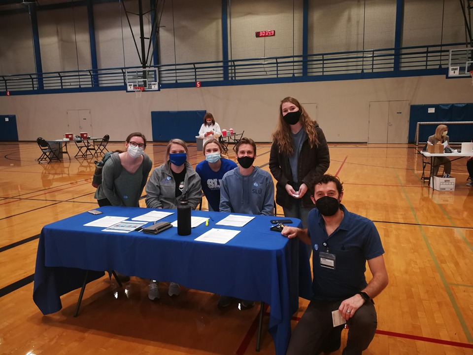 SLU PA students working SLU's vaccination clinic