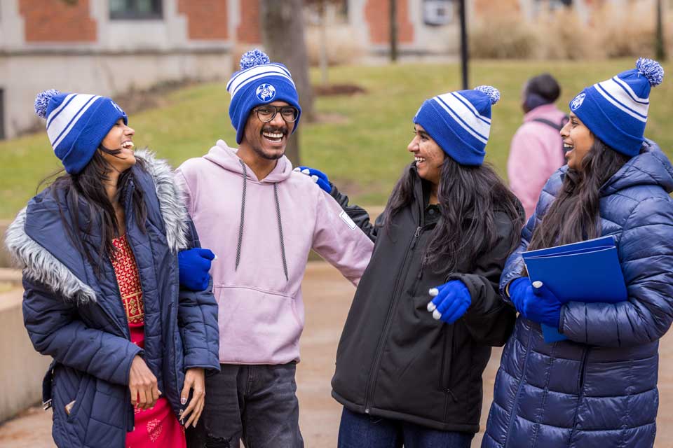 Students outside on campus during international students orientation 