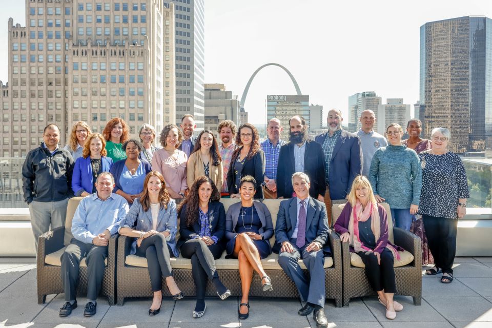 This is a group photo of the Center for Health Law Studies faculty and the participants of the annual Health Law Scholars weekend.