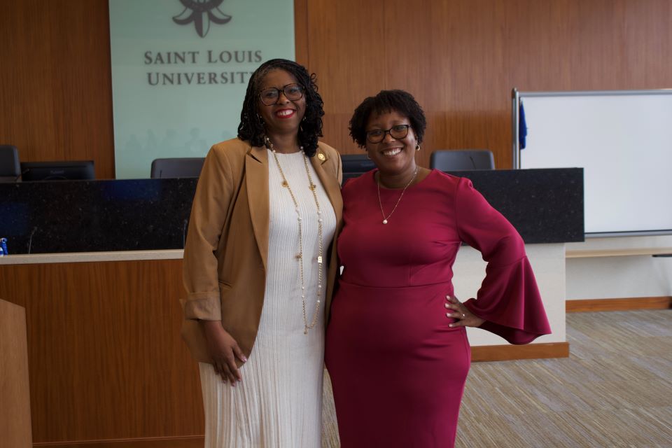 photo of Dean Johnson and keynote speaker Madiba Dennie together at the 2024 Childress lecture in the courtroom at Scott Hall