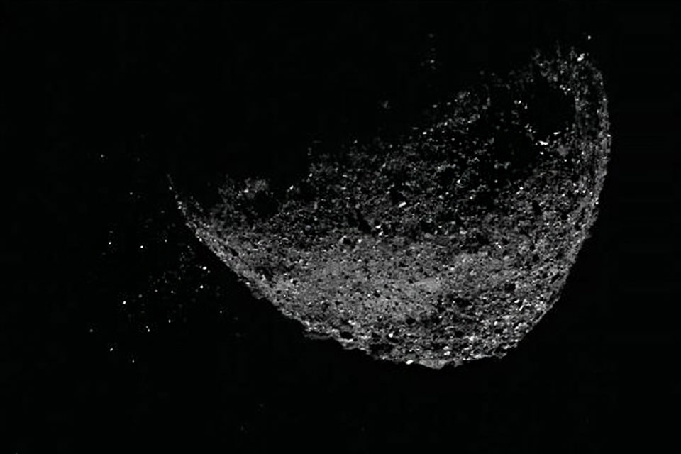 View of asteroid Bennu' surface. View of asteroid Bennu's surface, a large rocky object suspended in space.