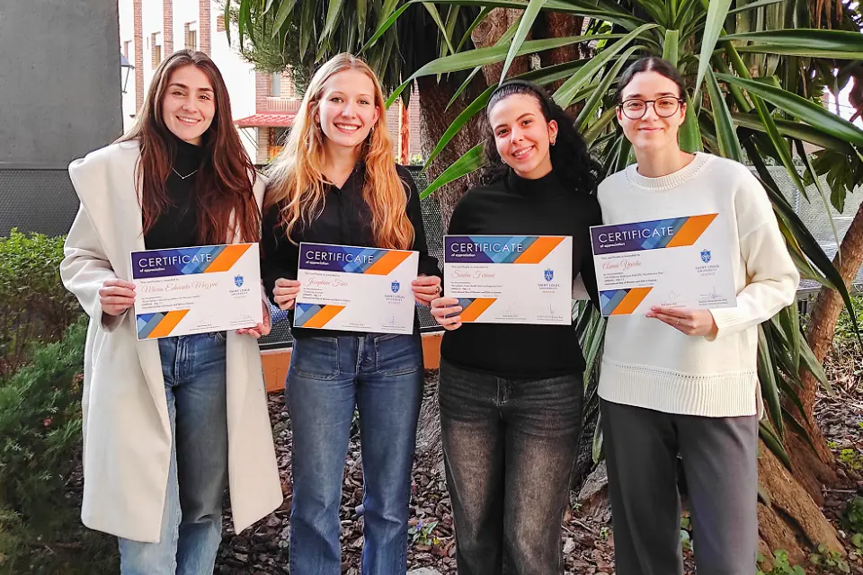 Mazzini, Furr, Feriani and Yaiche (left to right) pose with their certificates for participating in the UNESCO event on campus. Photo by Fairouz Medjahed, Ph.D.