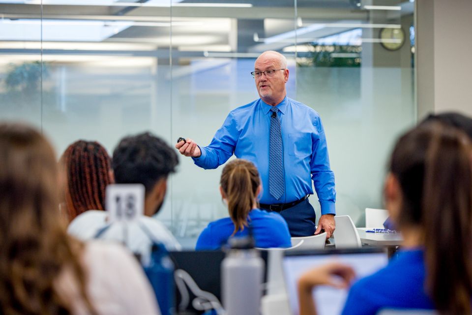 Anthony Breitbach teaches a class in interprofessional education on October 2, 2023.