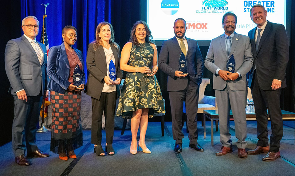  Hadi Alhorr, Ph.D. (International Business) third from right, was honored with the Global Ambassador Award at the 25th annual Growing Global event. Submitted photo.