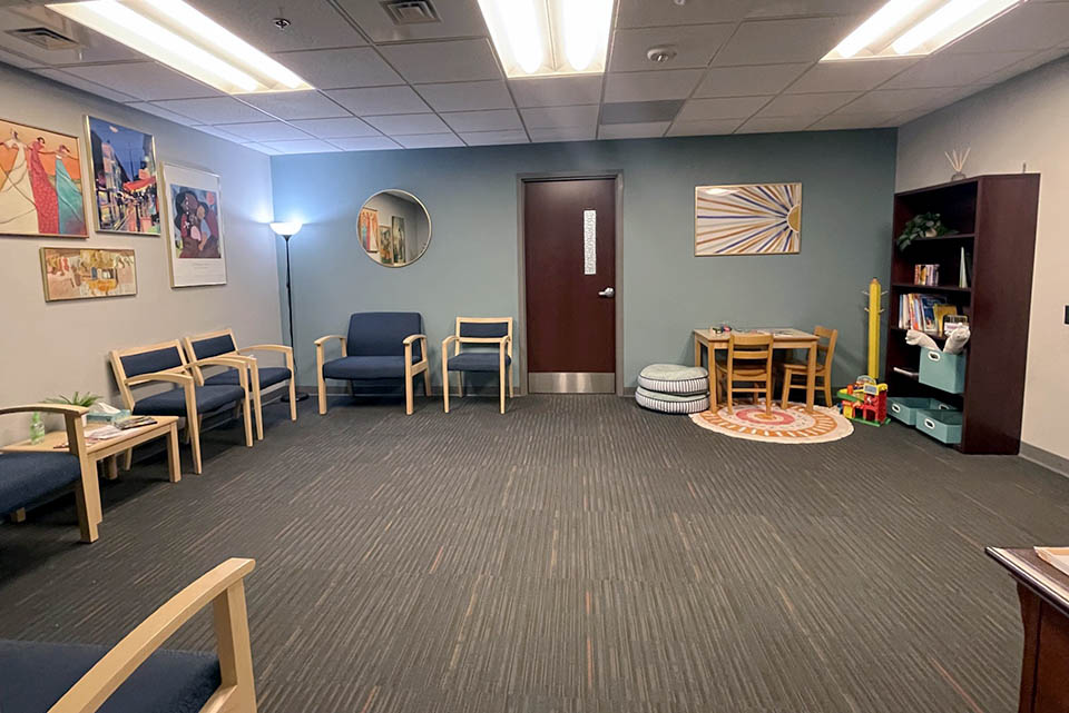 An empty waiting room inside the Psychological Services Center. 