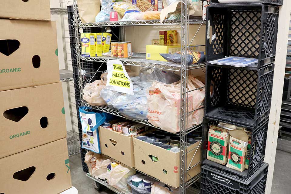 Turkeypalooza donations filled the shelves in Reinert Hall. Photo by Joe Barker. 

