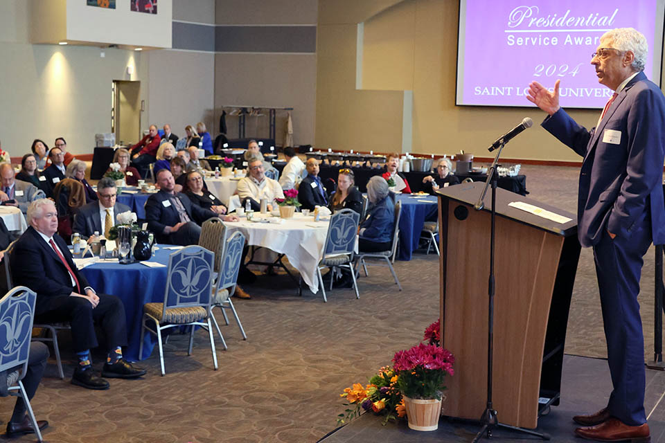 SLU President Fred P. Pestello, Ph.D., addressed the crowd at the 2024 Presidential Service Awards. Pestello was one the group being honored in recognition of his eight years of service at SLU. Photo by Joe Barker. 