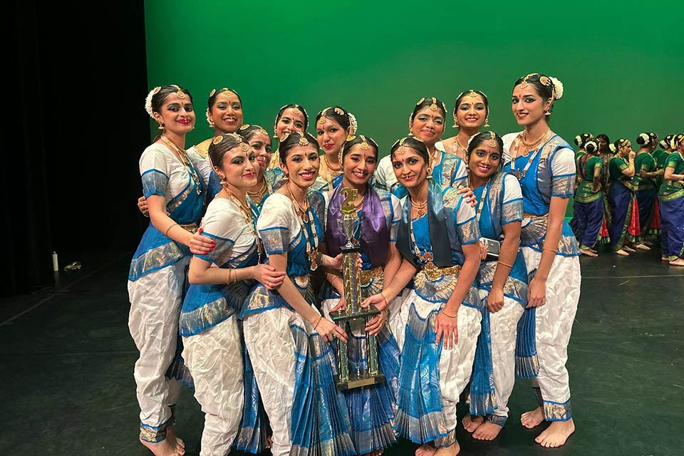 Members of SLU Omkara celebrate with their second-place trophy. 