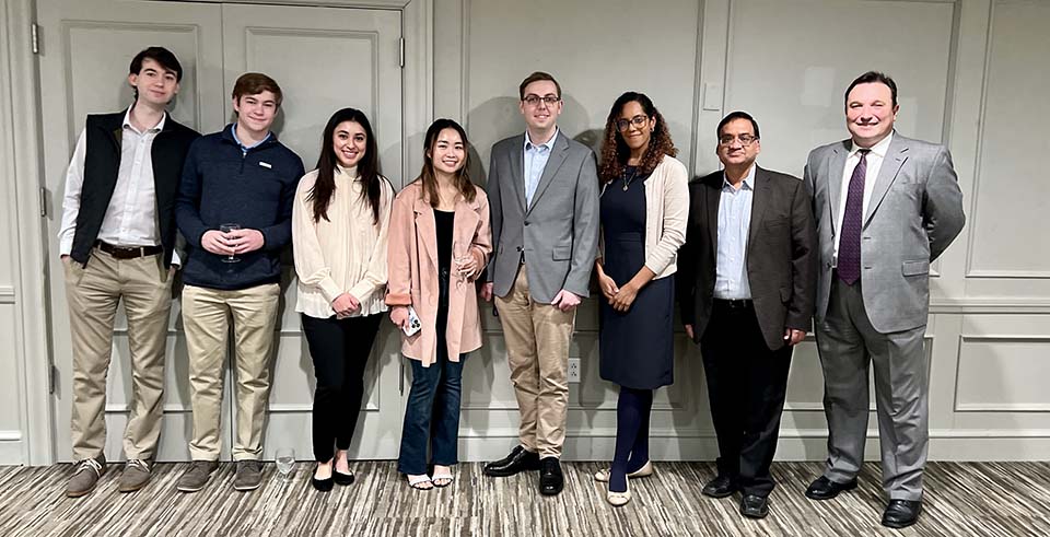 From left are Daniel Gaynor, Nicholas Finefrock, Sana Tan, Jessica Lopez, Erik Pociecha, Alliana Blackwell, assistant director of stewardship; Naresh Bansal, Ph.D., academic chair for the Department of Finance; and Olgun Sahin, Ph.D., associate professor of finance. Photo Submitted. 