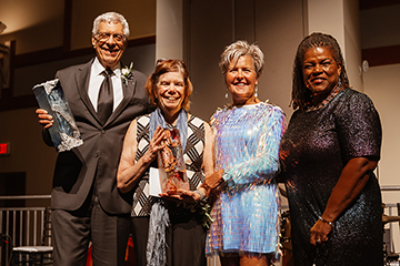 SLU’s Fred and Fran Pestello pose for a photo with Grand Center President and CEO Peg Weathers and local broadcast legend Carol Daniel, who emceed the Sept. 20 gala. Photo courtesy of Grand Center Inc.